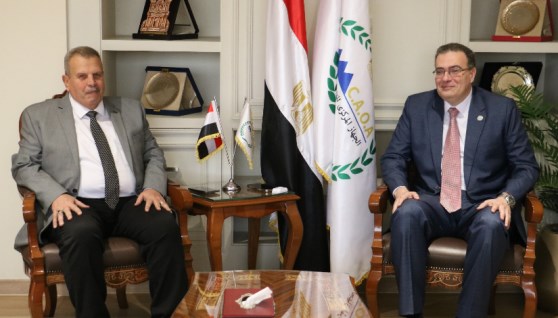 رئيس الجهاز المركزي للتنظيم والإدارة مع رئيس الهيئة القومية لسكك حديد مصر 