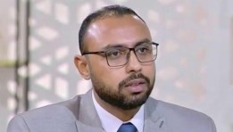  الدكتور علي الإدريسي، أستاذ الاقتصاد الدولي