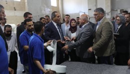 كامل الوزي 