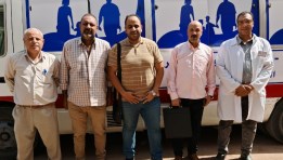عاملين بقوافل مبادرة حباة كريمة 