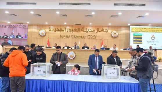 تسليم إخطارات تخصيص للمواطنين بالعبور الجديدة