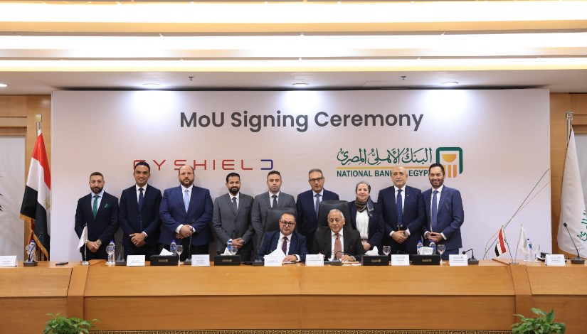 جانب من توقيع البروتوكولات التعاون بين الشركة ساي شيلد والبنك الأهلي 